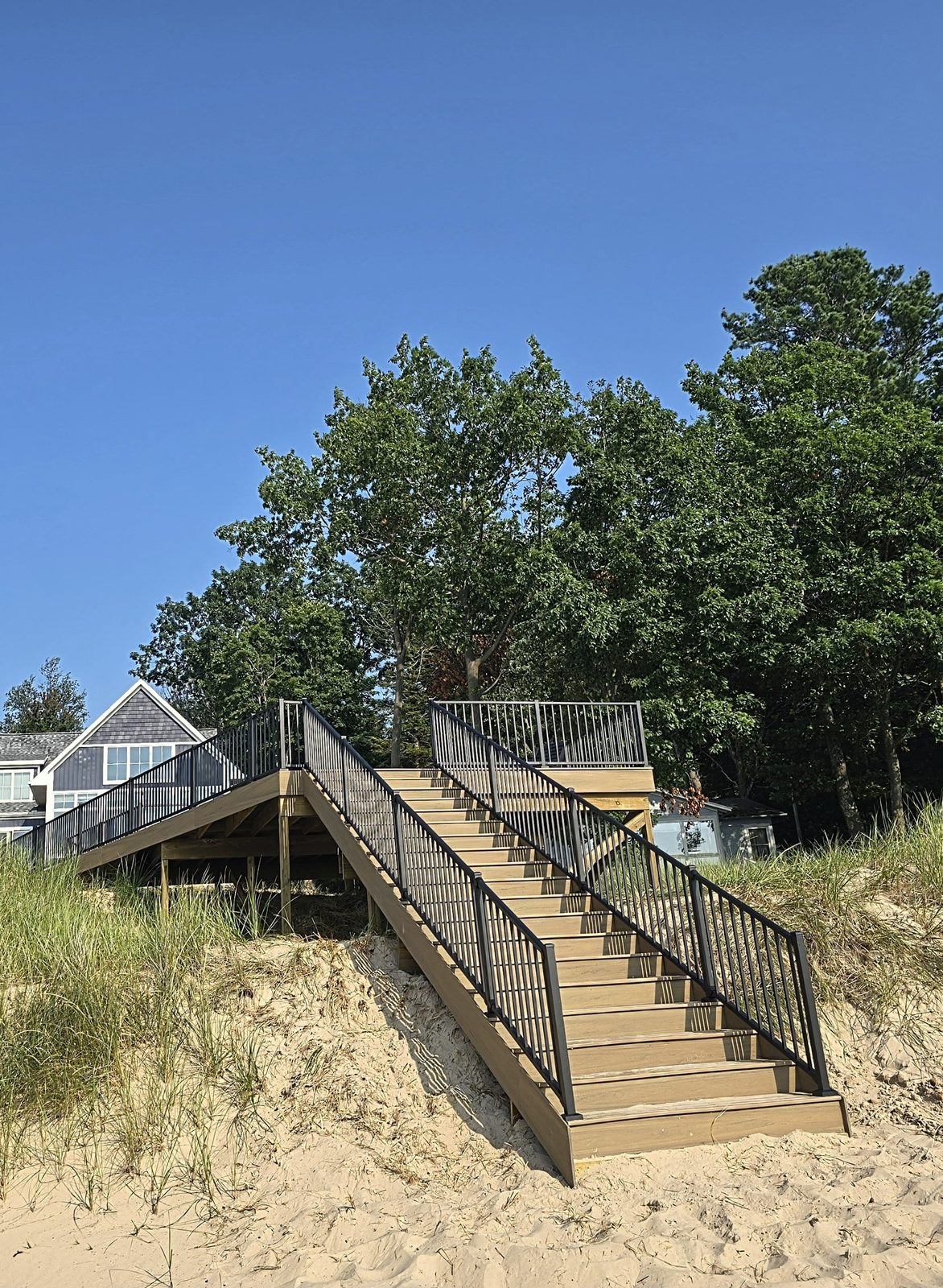 Pentwater composite stairs through sand dunes to the beach